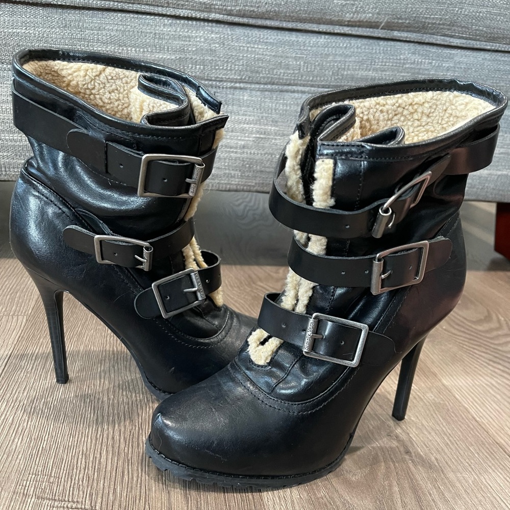 Stiletto black boots.
